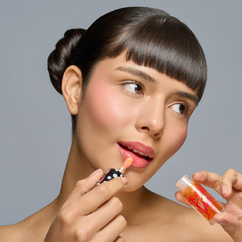Lip Oil Mágico Cruella